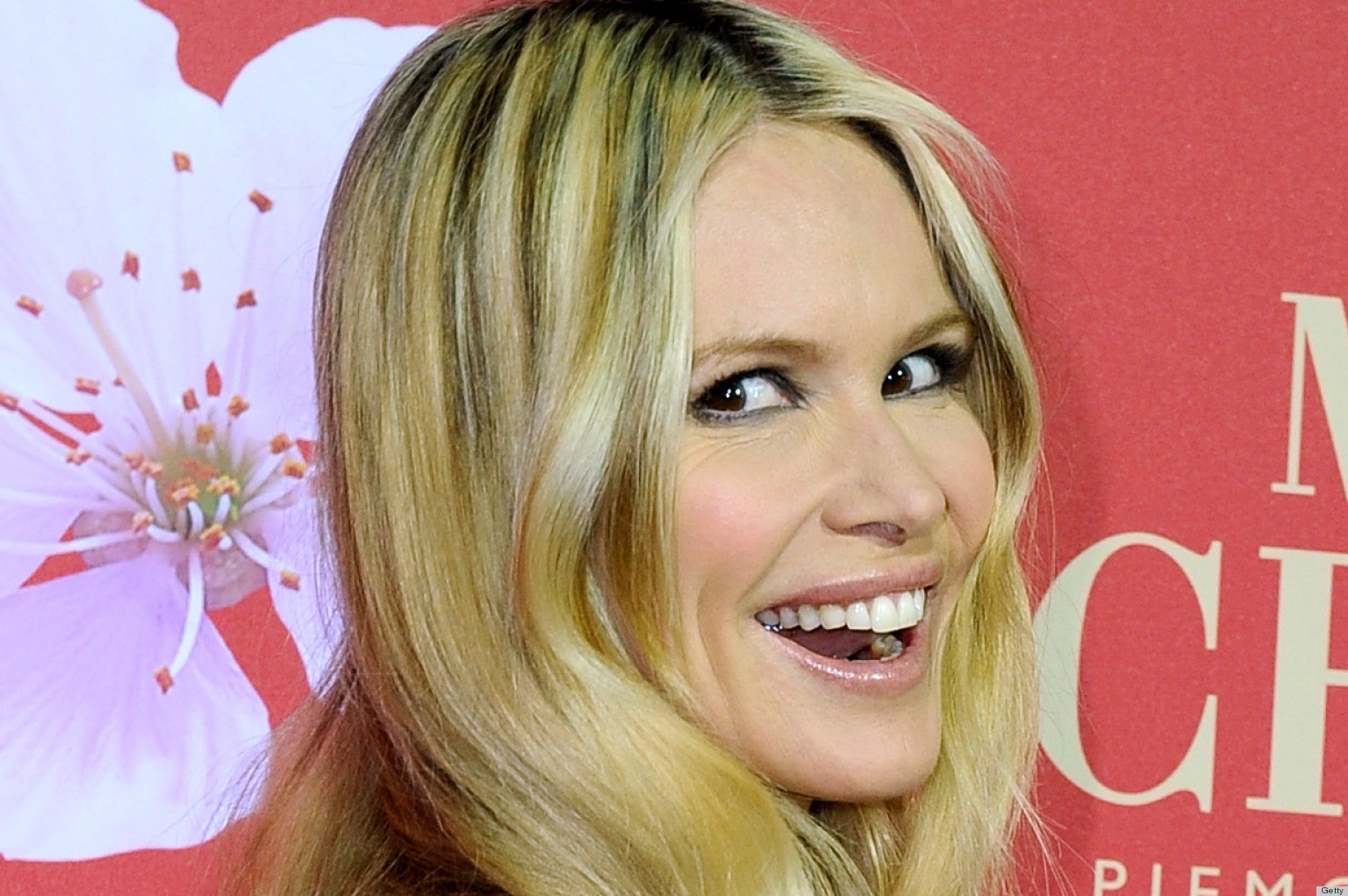 Australian actress Elle Macpherson poses upon arrival at a party celebrating the Saint Barbara Feast Day held for German children rights association "Strassenkinder Leipzig" at the Nymphenburg castle in Munich, southern Germany. AFP PHOTO / URSULA DUREN ++ GERMANY OUT (Photo credit should read URSULA DUREN/AFP/Getty Images)