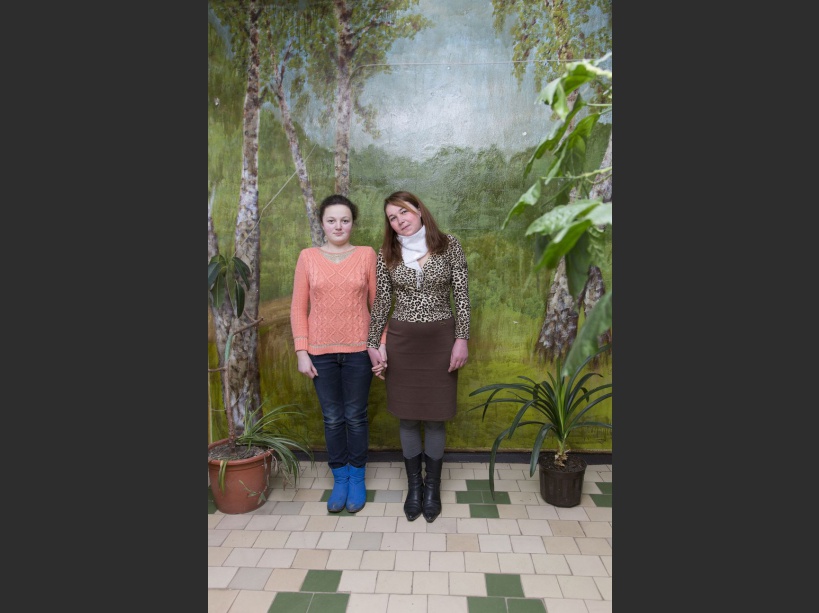 Olga and her mother Natasha posing for a picture at Narodichi's school where an NGO from Germany is visiting the area to check in children's health. Narodichi, UKRAINE - 26/02/2016./VALEROQUINTINA_UKR.017/Credit:Quintina Valero/SIPA/1604112020