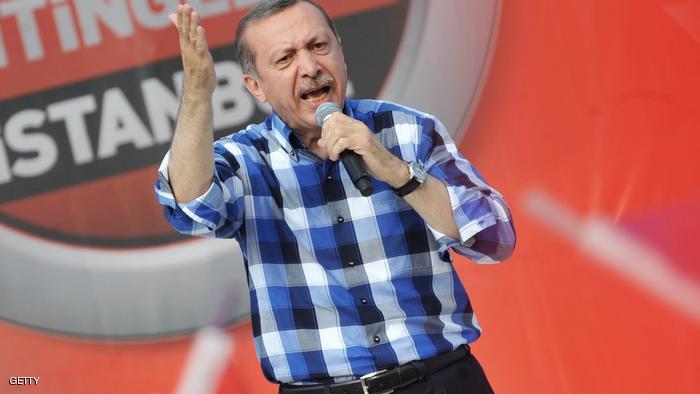 Turkish Prime Minister Recep Tayyip Erdogan makes a speach to supporters during a rally on June 16, 2013, in Istanbul. Turkish Prime Minister Recep Tayyip Erdogan rallied tens of thousands of his supporters in Istanbul on Sunday, hours after ordering a crackdown on anti-government protesters in a city park and sending tensions soaring in two weeks of unrest. AFP PHOTO / OZAN KOSE (Photo credit should read OZAN KOSE/AFP/Getty Images)